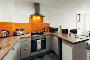 Η κουζίνα ή μικρή κουζίνα στο Halifax House, One Bedroom Apartment 216 +2 φωτογραφίες