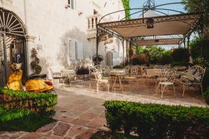 Κήπος έξω από το Palazzo Radomiri Heritage Boutique Hotel