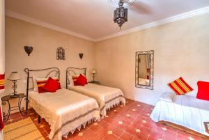 Riad Janoub客房内的一张或多张床位