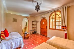 Riad Janoub客房内的一张或多张床位