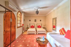 Riad Janoub客房内的一张或多张床位