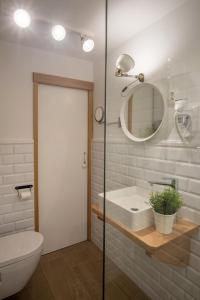 Koupelna v ubytování Apartments Kantunal