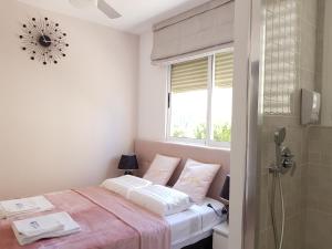 Posteľ alebo postele v izbe v ubytovaní Apartamento Elizabeth