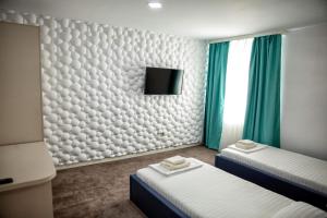 Foto dalla galleria di Pensiunea Beny a Târgu Jiu Altre 33 foto