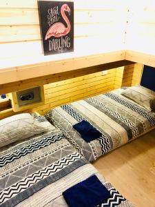 Ένα ή περισσότερα κρεβάτια σε δωμάτιο στο Blu Cabin Gay Poshtel