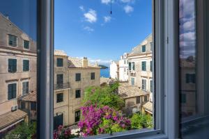 a view from a window of a city at Dousmani Corfu Old Town Studio Suite in Corfu Town