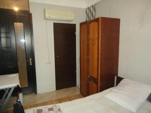Postel nebo postele na pokoji v ubytování Guest House R&T