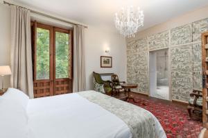 Postel nebo postele na pokoji v ubytování Alquería Calatrava B&B + 37 fotografií