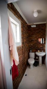 Koupelna v ubytování Inyameko BnB