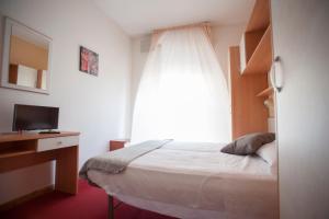 Postel nebo postele na pokoji v ubytování Villa Silvie Rose