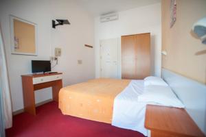 Postel nebo postele na pokoji v ubytování Villa Silvie Rose