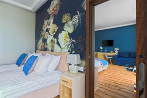 Postel nebo postele na pokoji v ubytování Redling Hotel