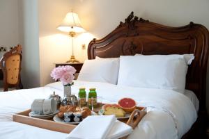 A bed or beds in a room at Beamish Hall Country House Hotel, BW Premier Collection 