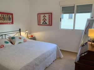 Postel nebo postele na pokoji v ubytování Apartamento frente al Mar