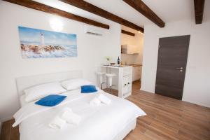 Posteľ alebo postele v izbe v ubytovaní Studio apartments Tara