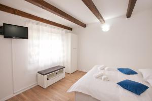 Posteľ alebo postele v izbe v ubytovaní Studio apartments Tara