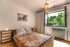 Postel nebo postele na pokoji v ubytování Apartments Mare
