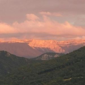 a view of a mountain range in the distance at gite les iris in La Robine