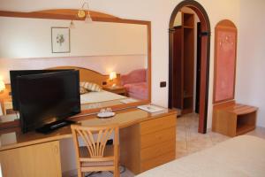 TV a/nebo společenská místnost v ubytování Hotel Nettuno