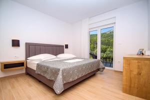 Postel nebo postele na pokoji v ubytování Villa Tela