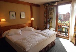 Postel nebo postele na pokoji v ubytování Sport Hotel