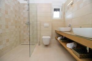 Koupelna v ubytování Villa Tela