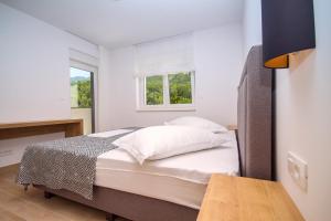 Postel nebo postele na pokoji v ubytování Villa Tela
