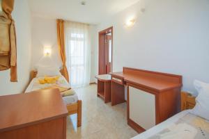 Postel nebo postele na pokoji v ubytování Stefanov 2 Hotel