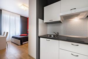 Kuchyň nebo kuchyňský kout v ubytování Affittacamere My Home
