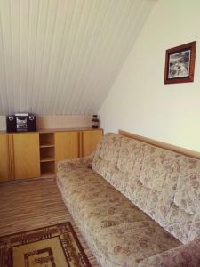 a bedroom with a bed in a room at APARTAMENT ZACISZE in Grzybowo