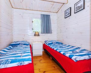 Postel nebo postele na pokoji v ubytování Domki DanTom