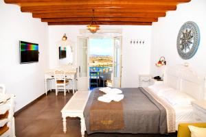 Ένα ή περισσότερα κρεβάτια σε δωμάτιο στο Hotel Messaria