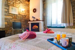 Postel nebo postele na pokoji v ubytování Pelion Goddess Villas
