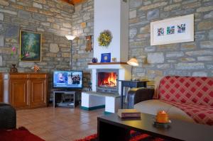 TV a/nebo společenská místnost v ubytování Pelion Goddess Villas