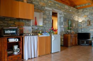 Kuchyň nebo kuchyňský kout v ubytování Pelion Goddess Villas
