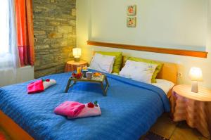 Postel nebo postele na pokoji v ubytování Pelion Goddess Villas