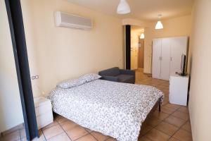 Posteľ alebo postele v izbe v ubytovaní Urbi Apartments
