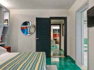 Postel nebo postele na pokoji v ubytování Hotel Hermitage