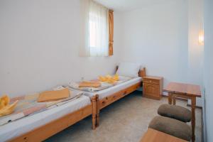 Postel nebo postele na pokoji v ubytování Stefanov 2 Hotel