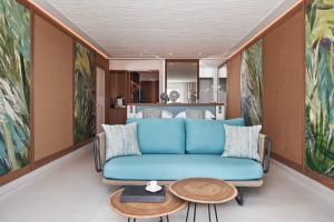 A seating area at Myconian Kyma, a Member of Design Hotels