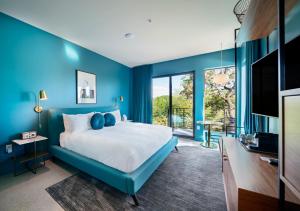 Voodi või voodid majutusasutuse The Ruby Hotel toas