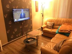 Televízia a/alebo spoločenská miestnosť v ubytovaní Tommy Apartman 2.0