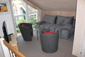 Ein Sitzbereich in der Unterkunft Strandhaus Deichkrone