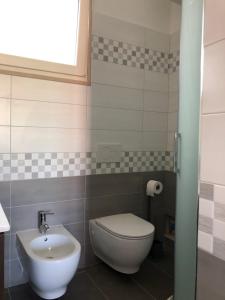 Kúpeľňa v ubytovaní Casa FRENK