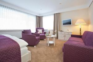 TV a/nebo společenská místnost v ubytování Hotel Garni Fürst von Waldeck