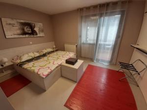 Postel nebo postele na pokoji v ubytování Apartma & RAfting