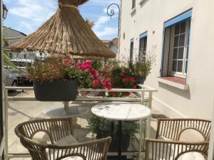 Patio nebo venkovní prostory v ubytování Hôtel Le Neptune en Camargue