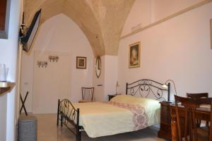Postel nebo postele na pokoji v ubytování Palazzo del SalTo