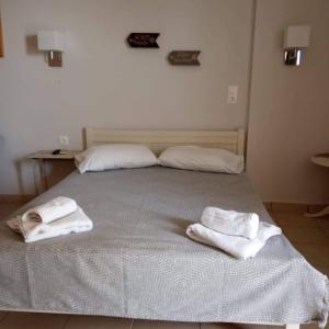 Ένα ή περισσότερα κρεβάτια σε δωμάτιο στο Angelika