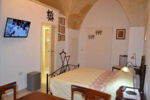 TV a/nebo společenská místnost v ubytování Palazzo del SalTo + 14 fotografií